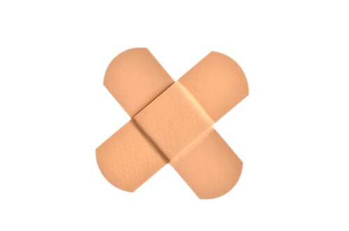 Two band-aids in x shape
